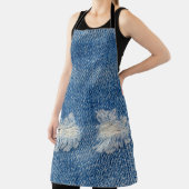 デニムのジーンズをリッピングしたクローズアップのテクスチャ。 エプロン (インサイチュ)