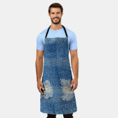 デニムのジーンズをリッピングしたクローズアップのテクスチャ。 エプロン (着用した状態)