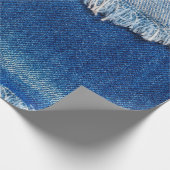 デニムジーンズの背景。デニム織物を裂き取り、b ラッピングペーパー (角)