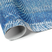 デニムジーンズの背景。デニム織物を裂き取り、b ラッピングペーパー (ロールコーナー)