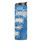 デニム・ジーンズの穴。破壊された破れた青いジェ タンブラー (回転左)