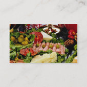 デリカテッセンの大皿、穿孔器ボールおよびpoinsettとの休日 名刺 (裏面)