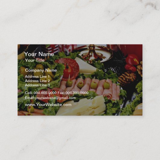 デリカテッセンの大皿、穿孔器ボールおよびpoinsettとの休日 名刺 (正面)