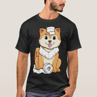 トイレの転が犬の子犬の紙 Tシャツ