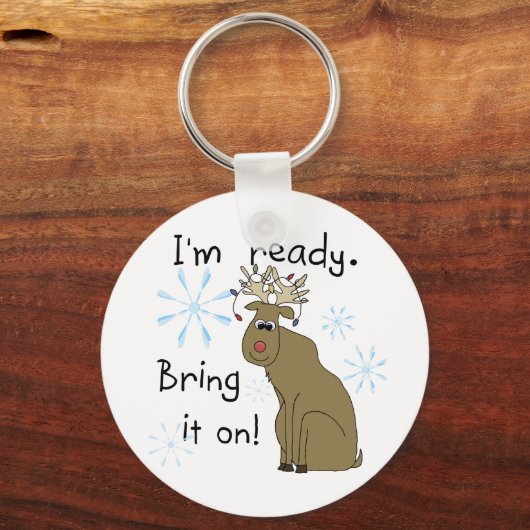 トナカイがクリスマスTシャツとギフトに向かう キーホルダー (正面)