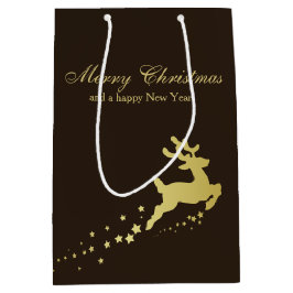 トナカイが付いている金クリスマスツリー ミディアムペーパーバッグ