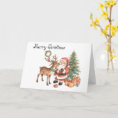 トナカイとサンタクロースの遊び心あふれるグリーティングカード カード (黄色い花)