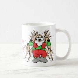 トナカイのおもしろいな漫画のクリスマスを抱き締めるサンタ コーヒーマグカップ