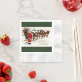 トナカイの紙ナプキンが付いているサンタそしてそり 縁ありカクテルナプキン (インサイチュ)