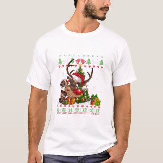 トナカイ犬を愛するサンタ Tシャツ