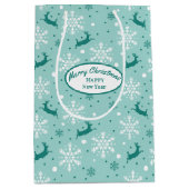 トナディースノーフレークティール（緑がかった色）ブルークリスマスメディアギフト ミディアムペーパーバッグ (正面)