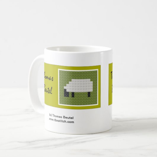 トマスBeutelのロゴのマグ コーヒーマグカップ (正面左)