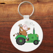トラクターを運転する牛 キーホルダー (正面)