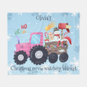 トラクタークリスマスムービー、ピンクを見る フリースブランケット (正面(横))