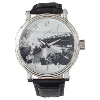 トラックをスピード化したゴーカートのまわりにレーサー 腕時計