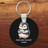 トランプに反対するペンギンたち キーホルダー (正面)
