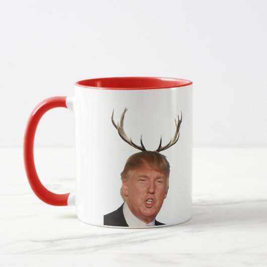 トランプのクリスマス:鹿の大統領 マグカップ (左)