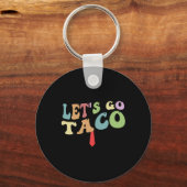 トランプは常に臆病者 Let's Go Taco おもしろ レトロ キーホルダー (正面)