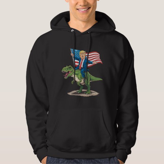 トランプ騎乗恐竜ティラノサウルス米国アメリカ国旗 パーカ (正面)
