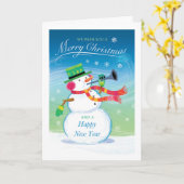 トランペットを吹く雪だるまのクリスマスカード カード (黄色い花)