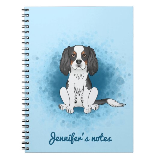 トリコラーカバリエキングチャールズスパニエル犬ドッグオンブルー ノートブック (正面)
