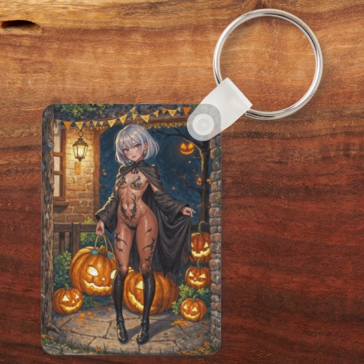 トリックまたはトレーター、勇敢なハロウィーンの衣装の女の子 キーホルダー (裏面)