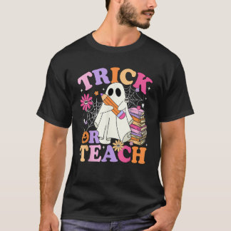 トリックまたは教えパンプキン幽霊の本読のハロウィー Tシャツ