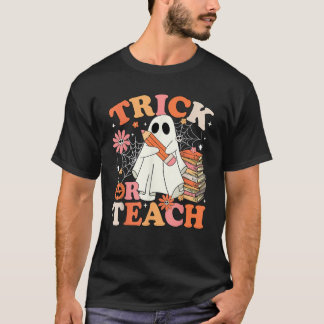 トリックまたは教えパンプキン幽霊の本読のハロウィー Tシャツ