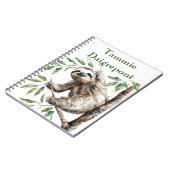 トレンディーの木の中のかわいいナマケモノ ノートブック (左側)