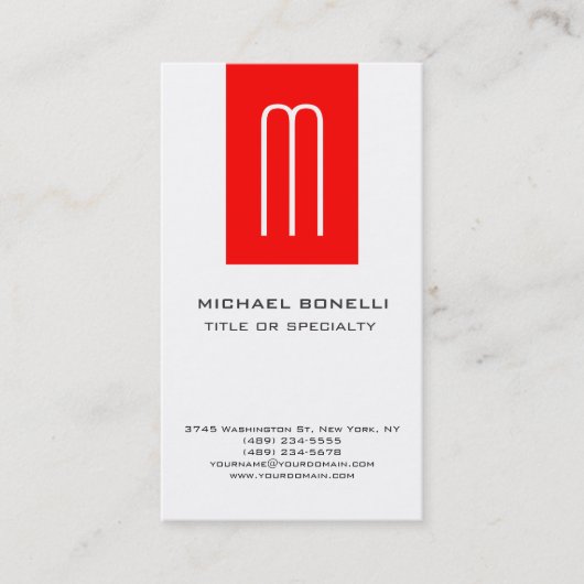 トレンディーモノグラム赤白縦型名刺 名刺 (正面)