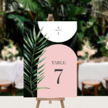 トロピカルアーチズパームリーフモノグラム結婚ズ テーブルナンバー<br><div class="desc">赤面のピンクと白のアーチは、灰色と水色のモノグラムとダークヤシの葉の背景の上にイラストレーション</div>