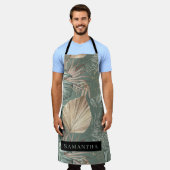 トロピカルウォーターのカラー金ゴールドとグリーン葉のパターン エプロン (着用した状態)