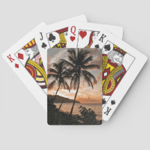 トロピカルサンセットパームツリーズシルエットビーチ