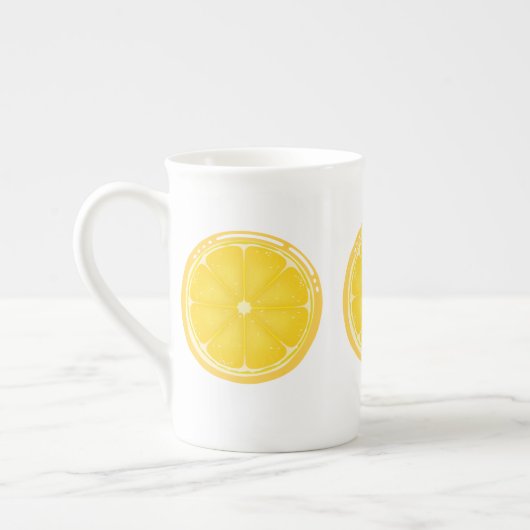 トロピカルシトラスサマーフルーツオレンジレモンのスライス ボーンチャイナマグカップ (左)