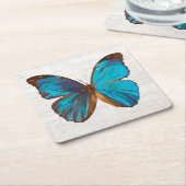 トロピカルブルーとターコイズジェムカラーバタフライ スクエアペーパーコースター (アングル)