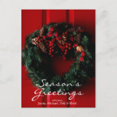 ドアでつるすクリスマスのリースのクローズアップ シーズンポストカード (正面)
