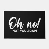 ドアマットようこそ！ノートユア・アウ・アゲイン・白黒 ドアマット (正面)