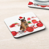 ドイツの羊飼い犬とクリスマスプレゼントSanta Hat コースター (左側)