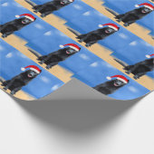 ドイツの羊飼い犬の座ってビーチサンタハット ラッピングペーパー (角)