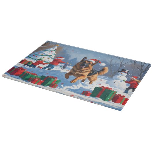ドイツの走シェパードの雪とクリスマス帽子 カッティングボード (角)