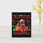 ドイツ人のシェパードに聖降誕祭のサンタドッグを頼む カード (黄色い花)