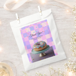 ドナッモダントが赤ちゃん市松模様にシャワーを振り掛ける フェイバーバッグ