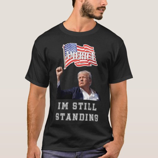 ドナルド・トランプ私はまだ立っている Tシャツ (正面)