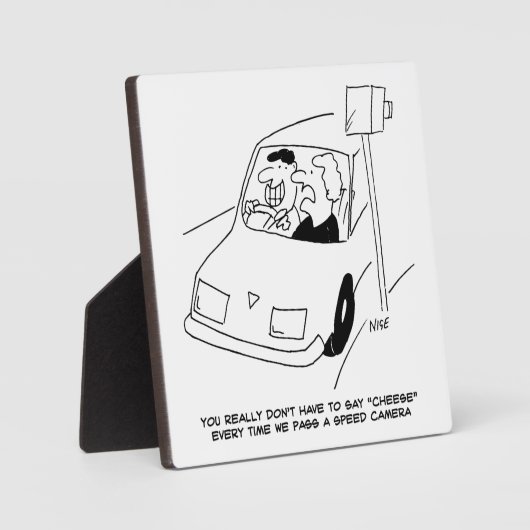 ドライバーはチーズの通過速度カメラと言う。おもしろい フォトプラーク (正面)