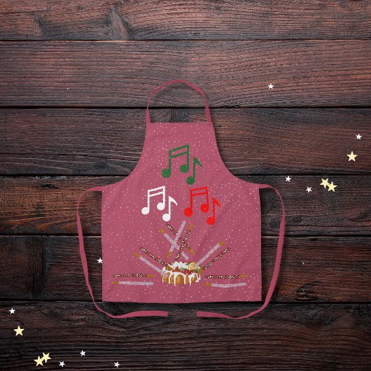 ドラムケーキ、クッキーバトン及び音符ピンク エプロン