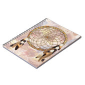 ドリームキャッチャーの羽と赤ビーズ ノートブック (左側)