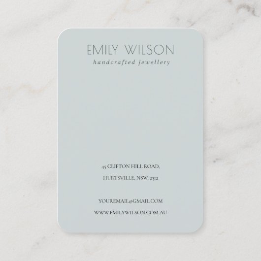 ドリームブルーアクアバタフライロゴイヤリングディスプレイ 名刺 (裏面)