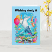 ドルフィンガーニングバースデーハットのケーキ誕生日を保持 カード (黄色い花)