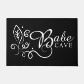 ドルムバベケイブ抽象芸術フローラアートモティーフオンブラック ドアマット (正面)