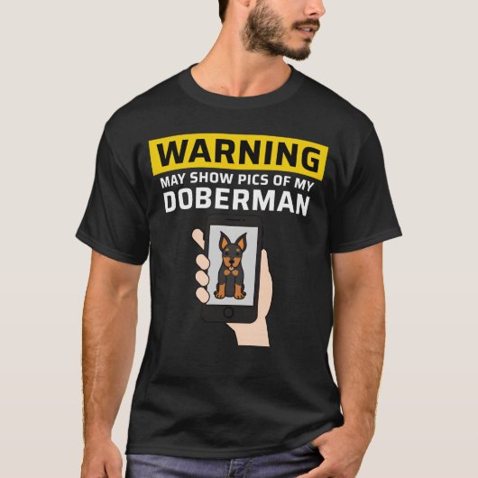 ドーベルマンを見せるかもしれないという警告 楽しい Tシャツ (正面)